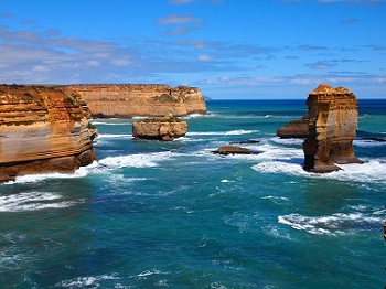 The Twelve Apostles rock formation can be see while driving along Great Ocean Road in Australia.